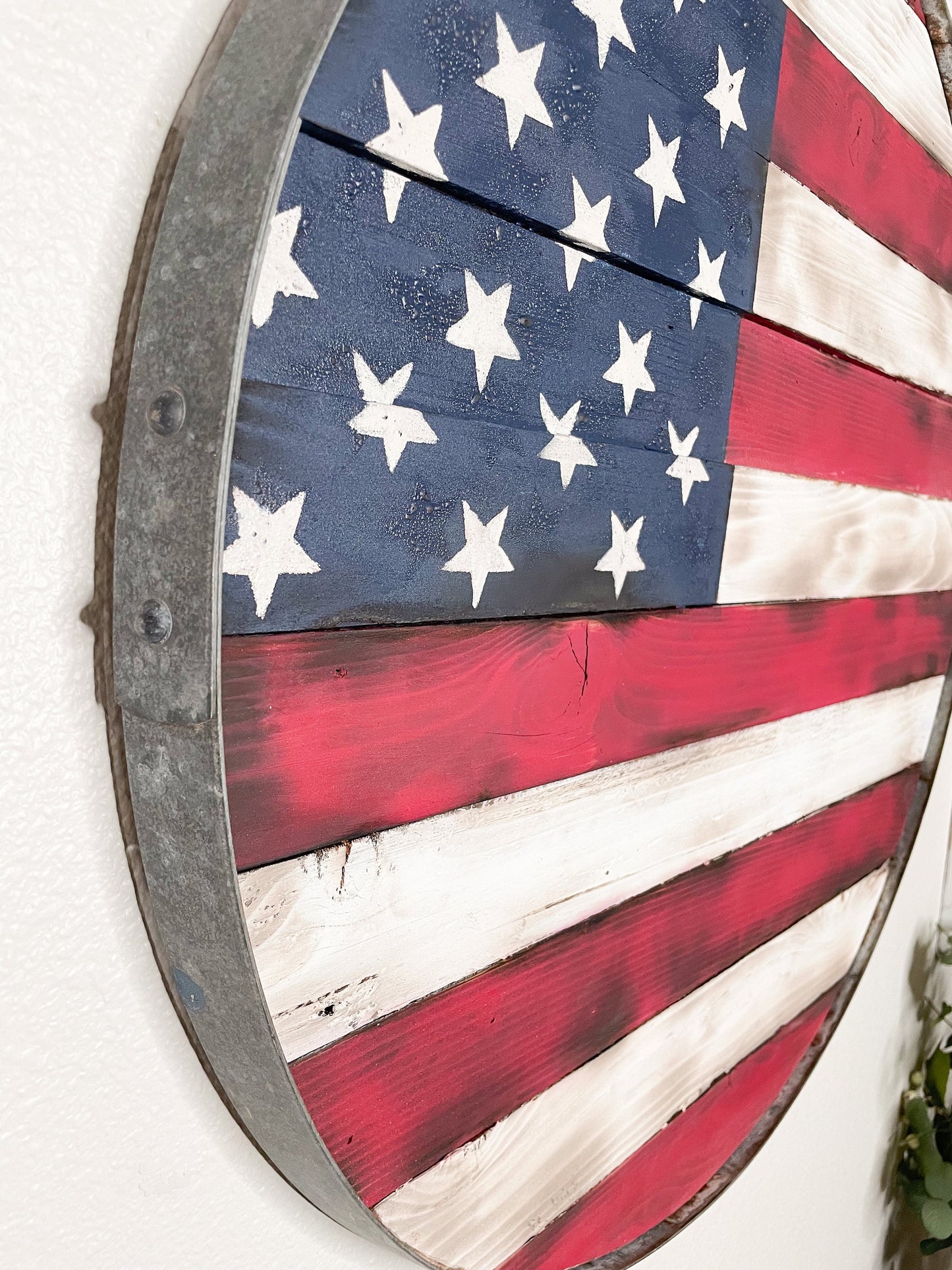 American Flag in wine barrel ring.  Rustic, burned, reclaimed wood flag