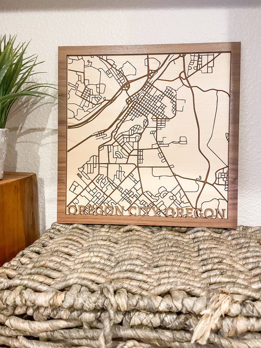 City maps, customized to your city.  2 layered wood laser engraved and cut city map