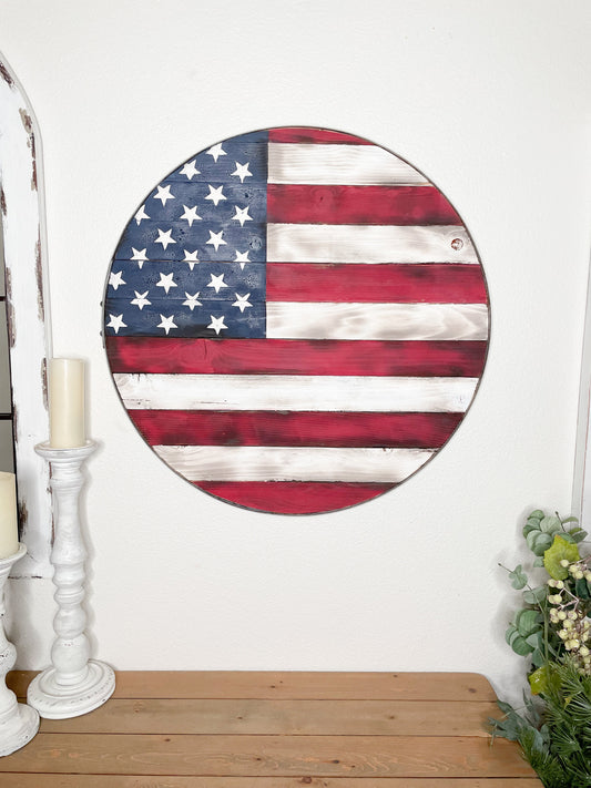 American Flag in wine barrel ring.  Rustic, burned, reclaimed wood flag
